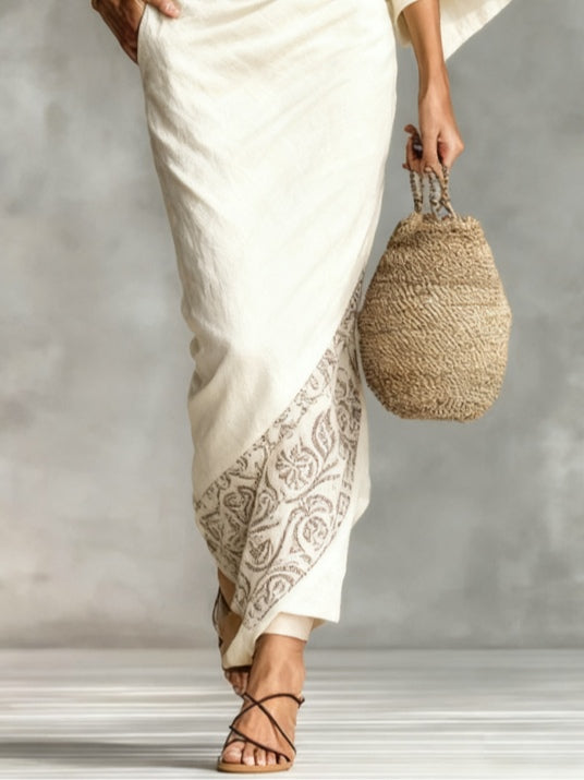 Set con top bianco dalla vestibilità morbida e gonna stampata